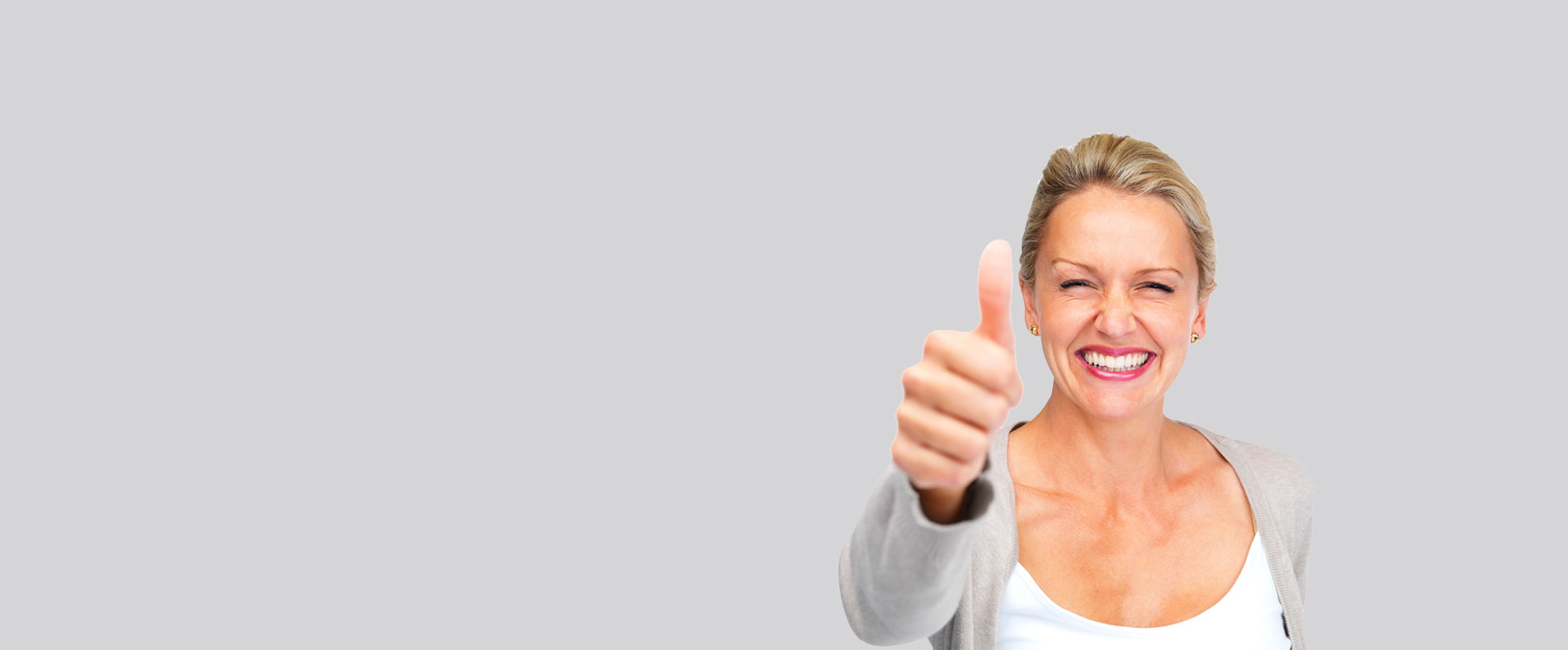 The image features a woman giving a thumbs-up gesture with a background that appears to be a plain wall or surface.